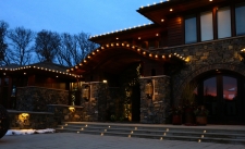 Front exterior of house with lights on front steps and roof | Woodbury MNChristmas Lighting in Lake Elmo, MN